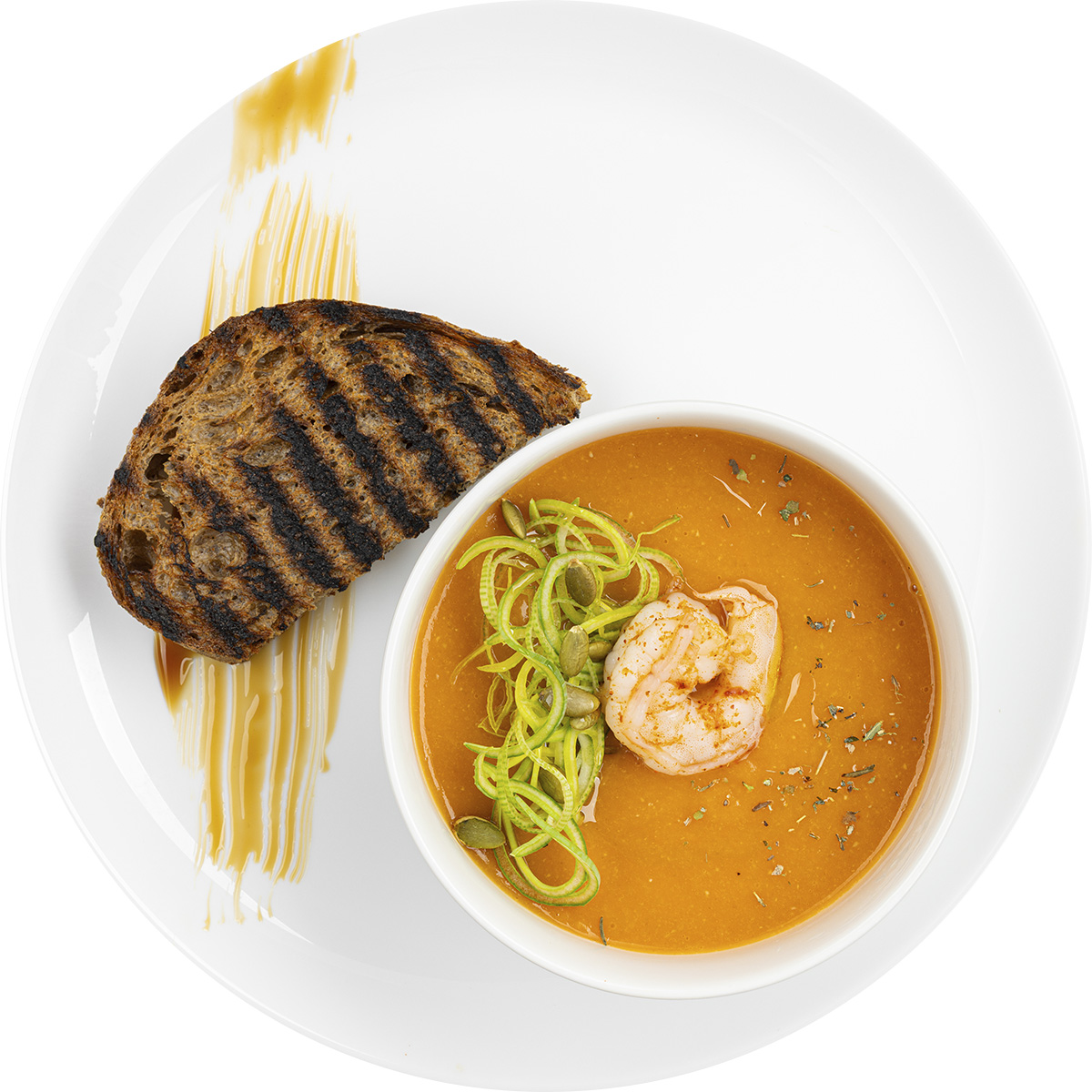 Крем-суп из чечевицы с ржаными сухариками и креветкой